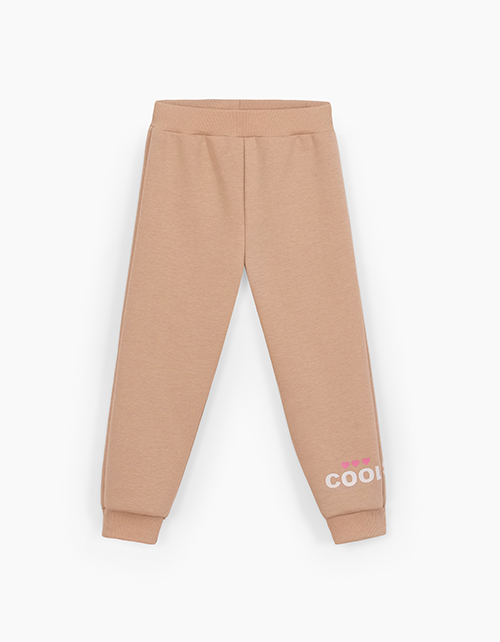Бежевые брюки-джоггеры для девочки