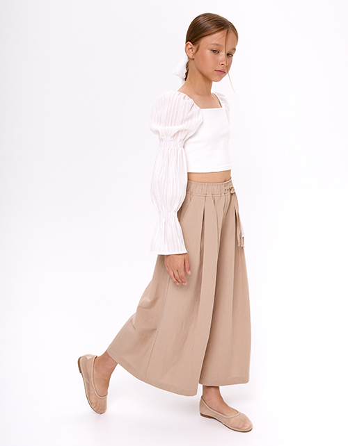 Укороченная молочная блузка для девочки Укороченная молочная блузка для девочки