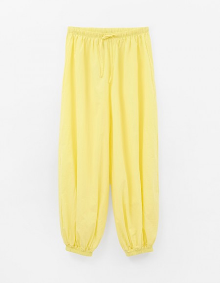 Светло-жёлтые брюки-аладдины для девочки